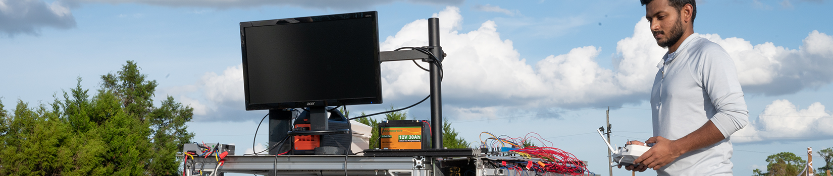 A person using a remote control with an AI-powered cart.